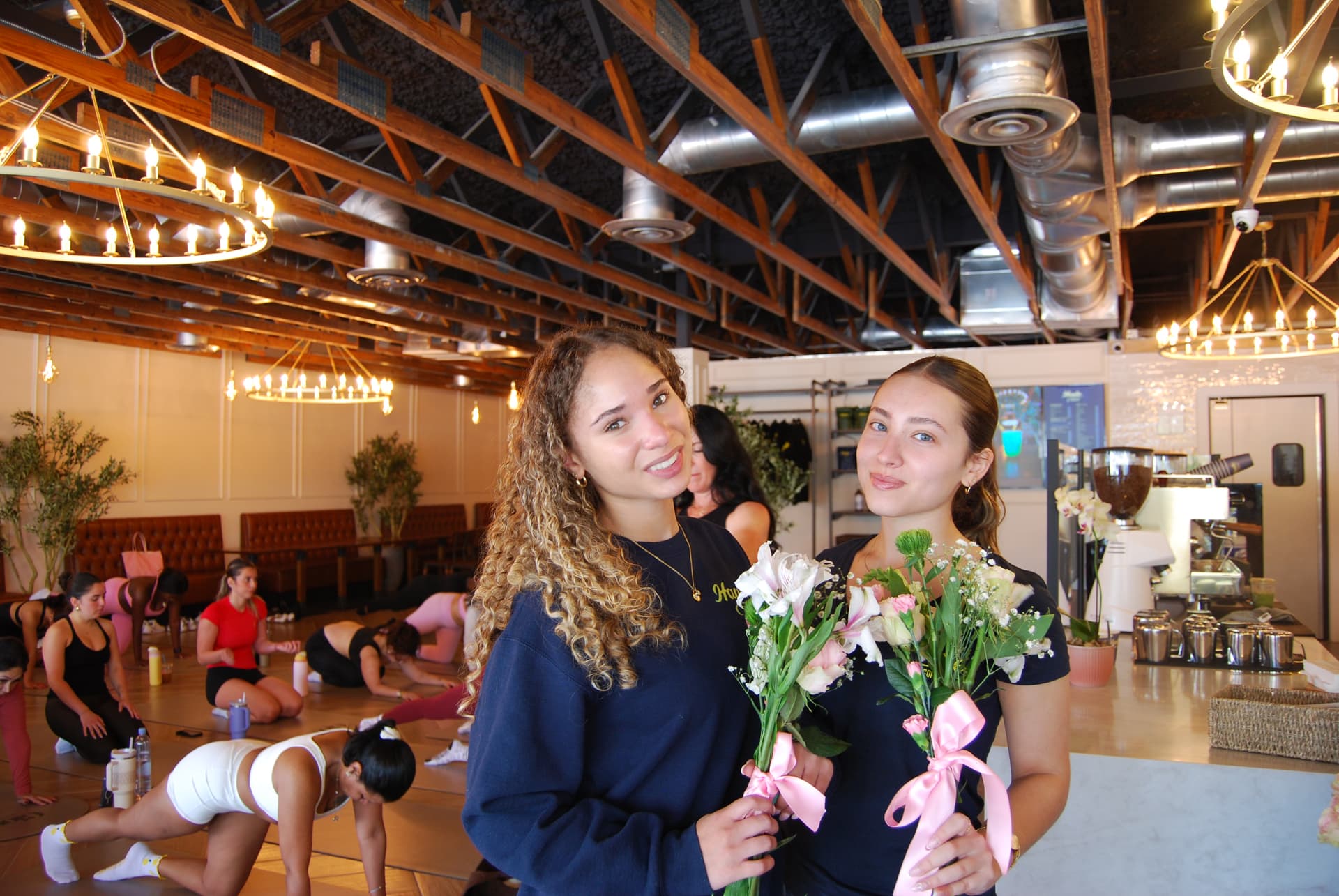 Attendees with bouquets