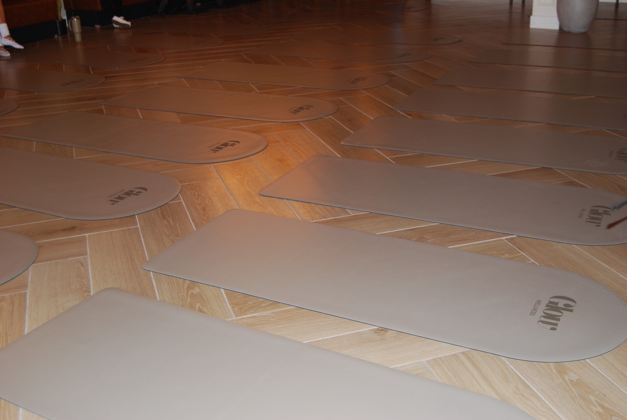 Glow Wellness mats laid out for class